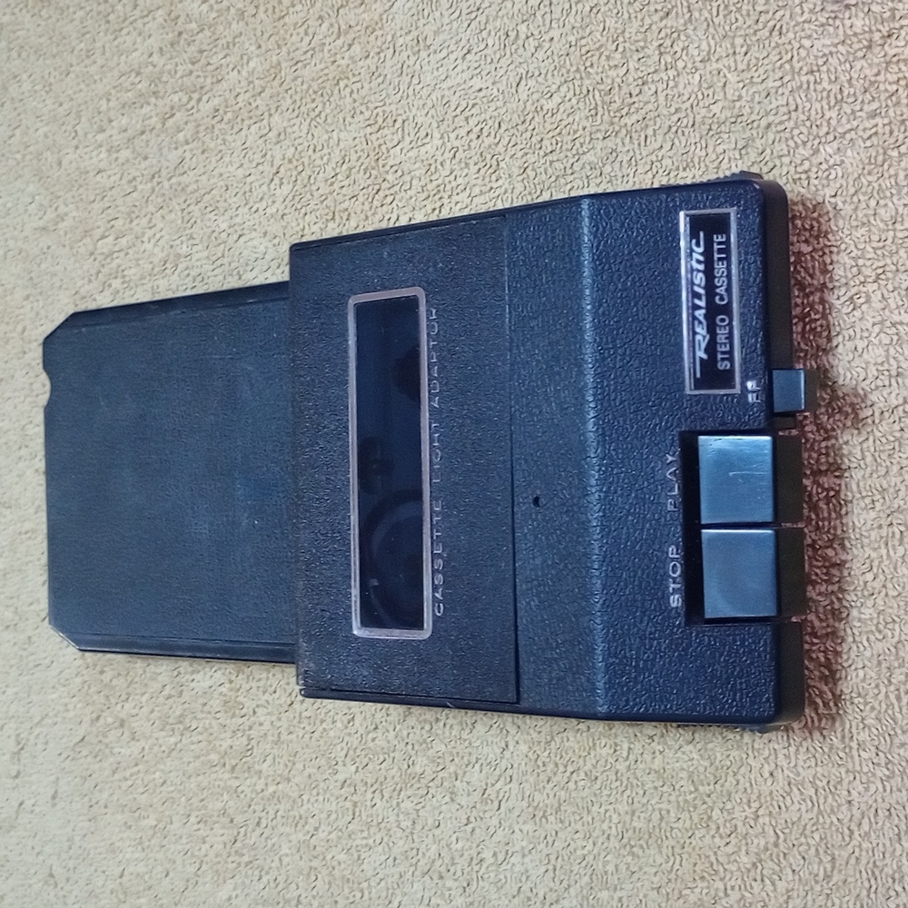 Realistic Cassette tape adapter for an Eight Track tape player .
